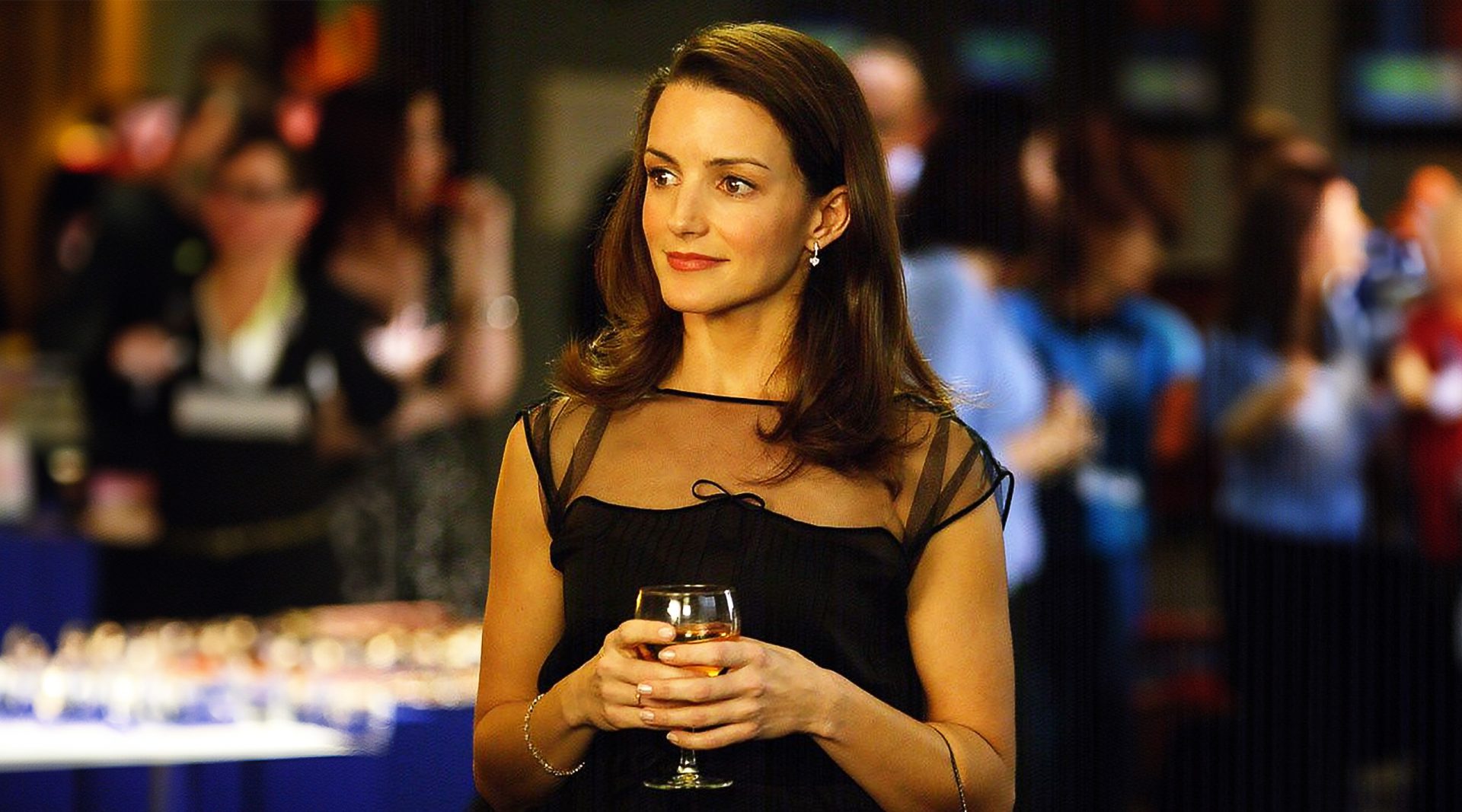 Charlotte York showcasing her iconic shoulder-length haircut, perfectly embodying the polished elegance of the Charlotte cut, a timeless hairstyle trend.