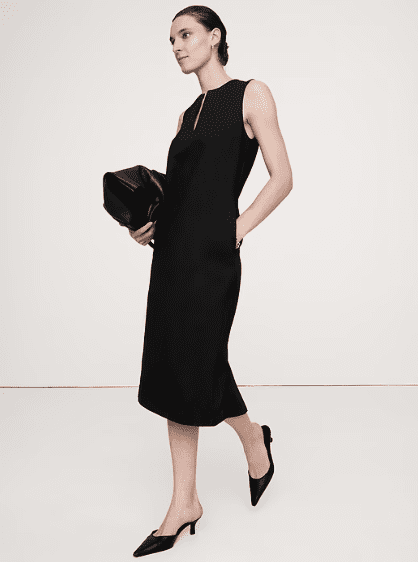Black sleeveless Corporate Dress with clean lines and tailored fit, minimalist and confident workwear style