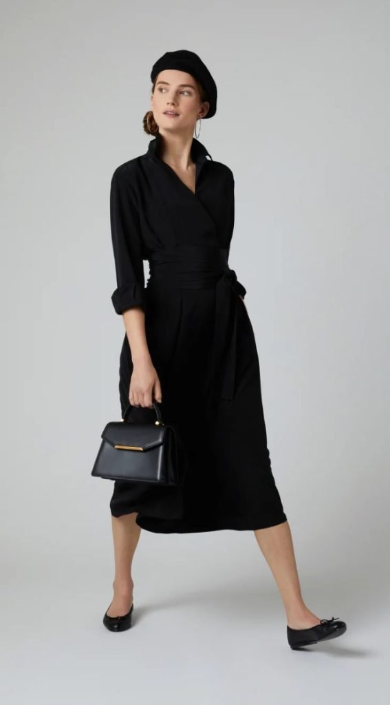 Black wrap midi dress styled with flats and handbag, effortless daytime wear in old money formal dresses