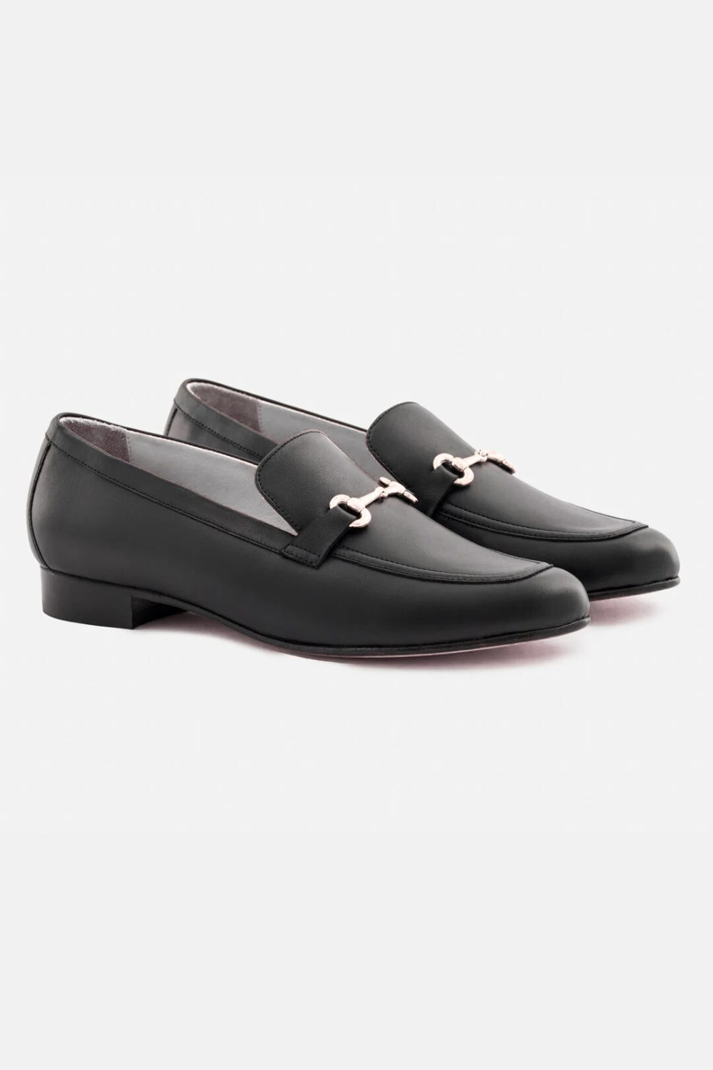 Classic black leather loafers with subtle hardware, an elegant footwear choice from 7 Timeless Pieces to Start 2026 Right