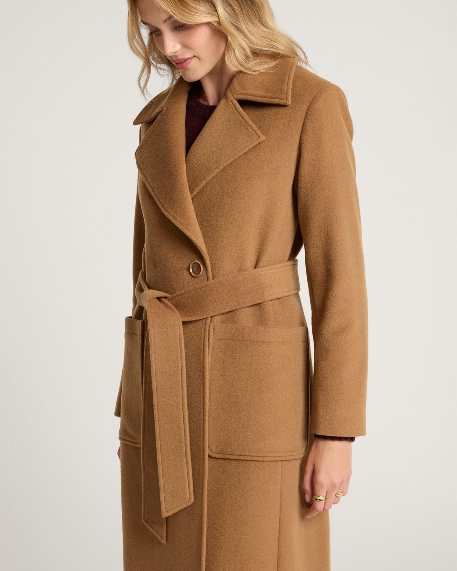 Camel belted wool coat with clean tailoring, ideal for Capsule Wardrobe 2026, showcasing timeless outerwear for a polished everyday look