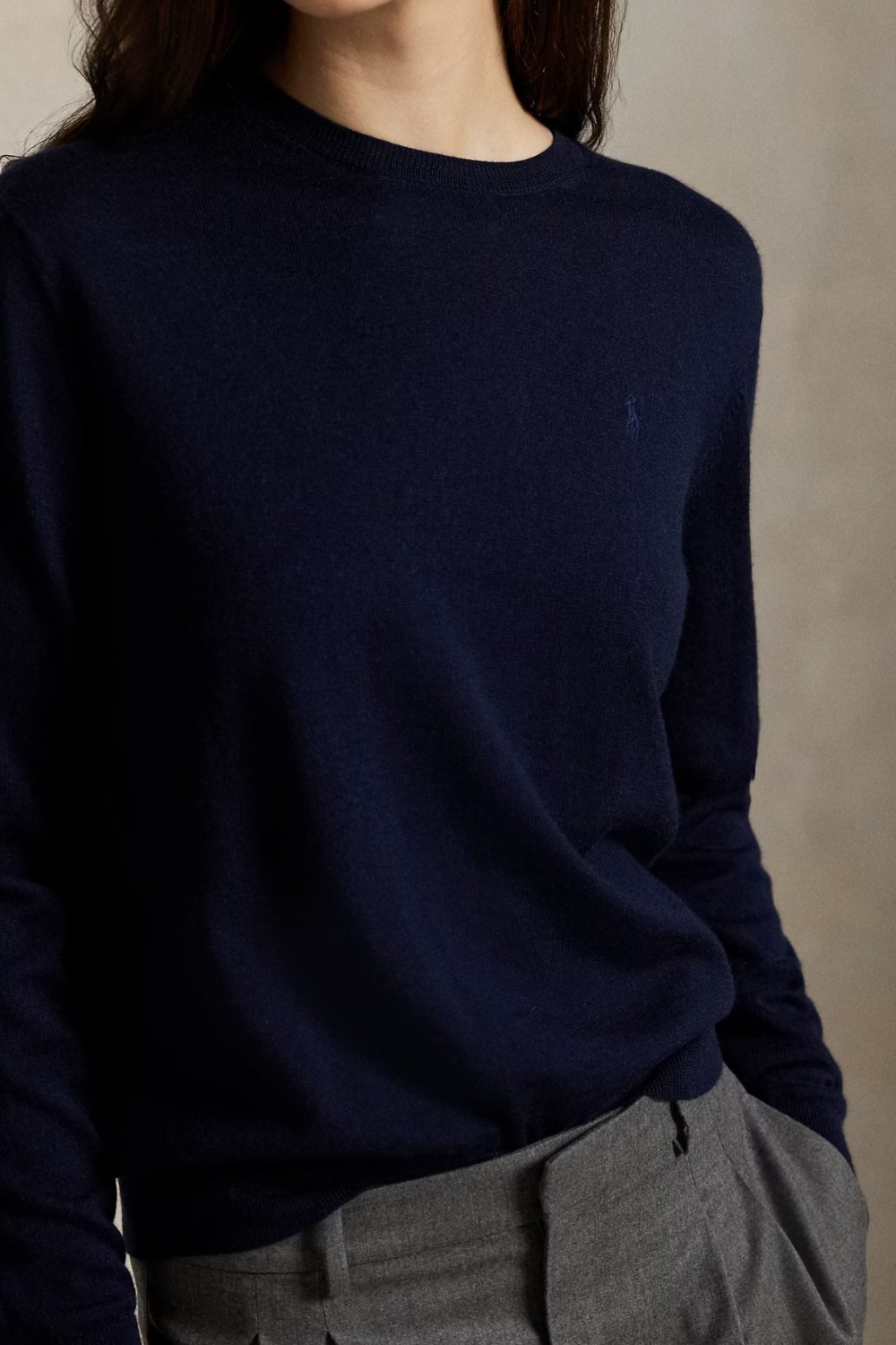 Navy knit sweater paired with tailored trousers, refined and simple Old Money Transitional Outfits For Early Spring look