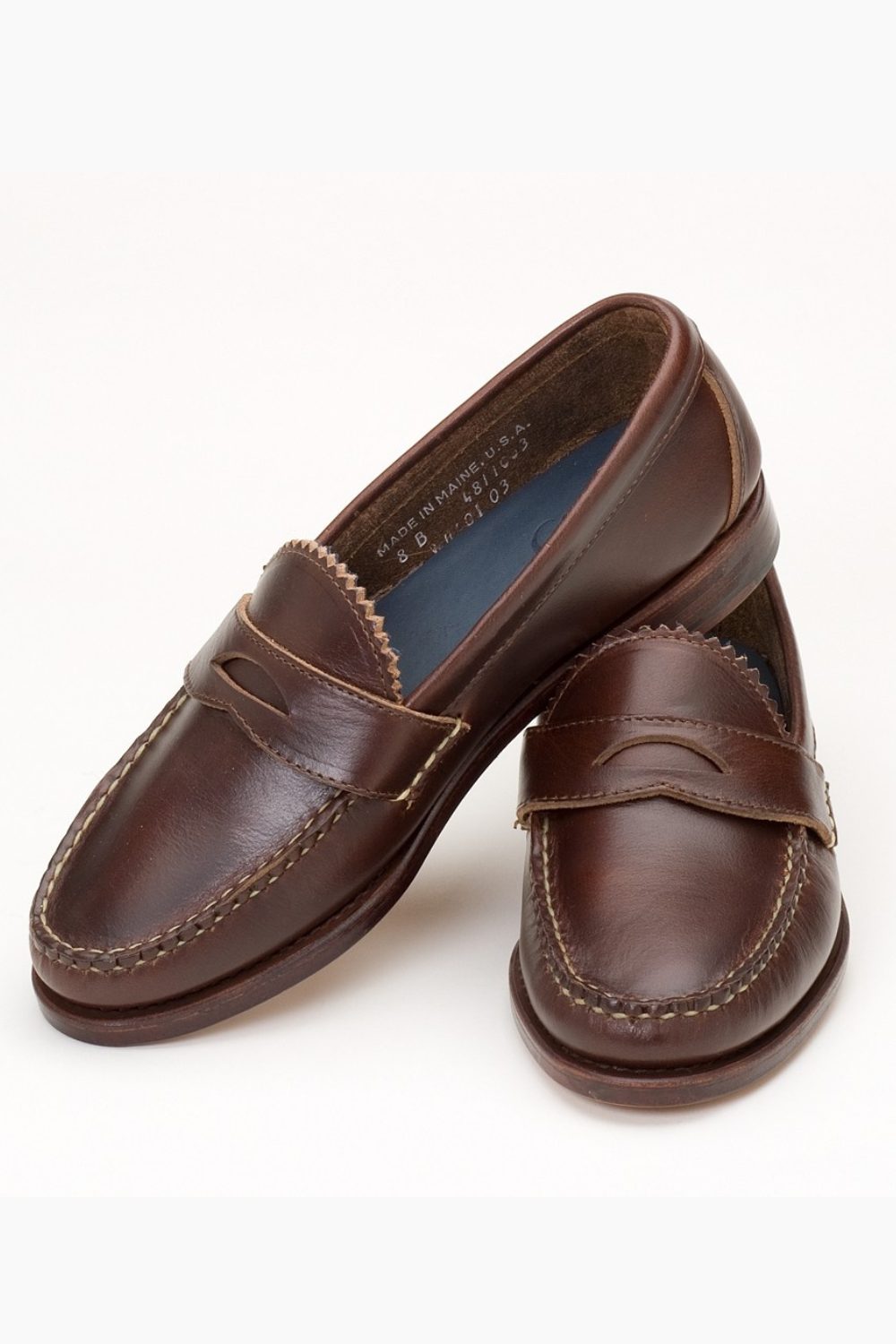 Brown leather loafers with classic stitching, an easy shoe choice for what to wear in March outfits.