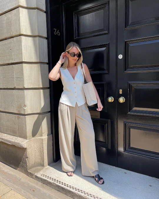 White Vest Top With Beige Wide Leg Trousers