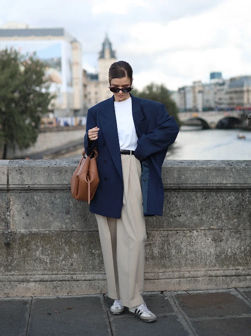 Navy Oversized Blazer With Beige Trousers And Casual Sneakers