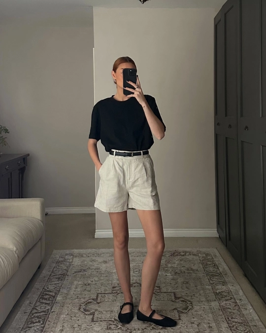 Black Top and Light Linen Shorts Minimal Look