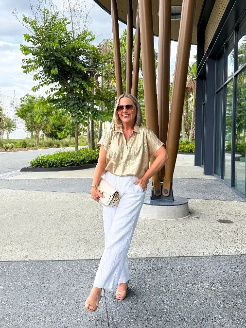 Champagne Polo and White Trousers