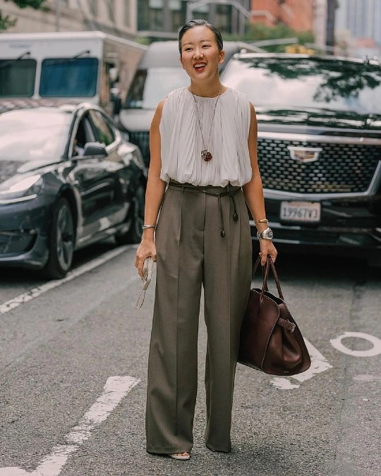 Pleated Sleeveless Blouse and High Waisted Trousers