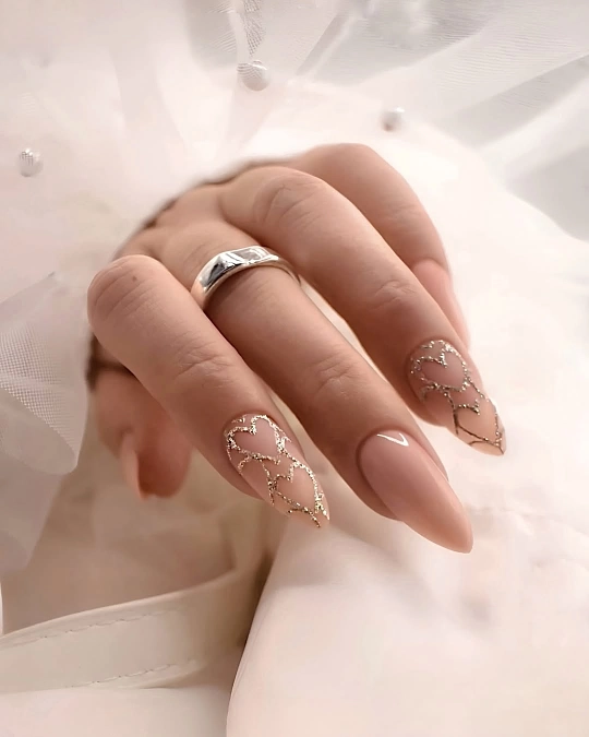 Nude Almond Nails with Gold Heart Art