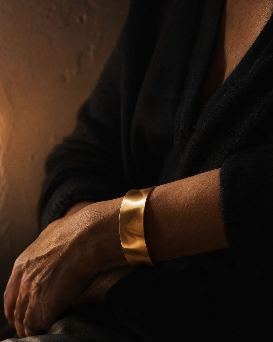 cheap christmas outfit look expensive: one substantial gold cuff bracelet worn alone