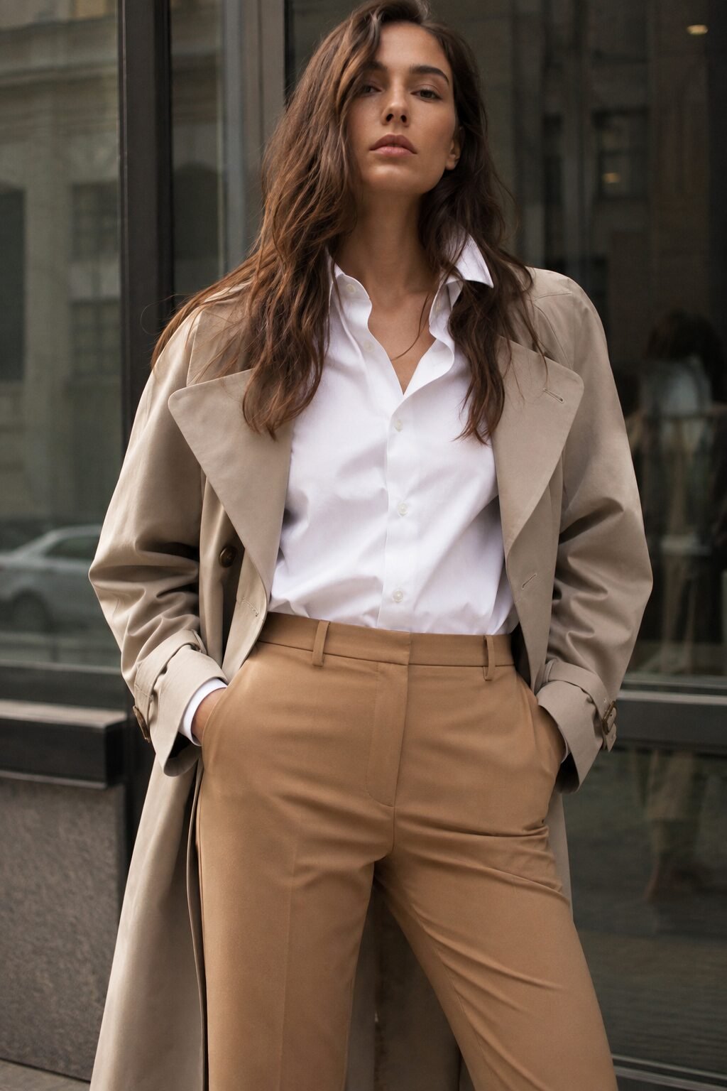 camel cigarette pants outfit with white button-down shirt and stone trench for office style