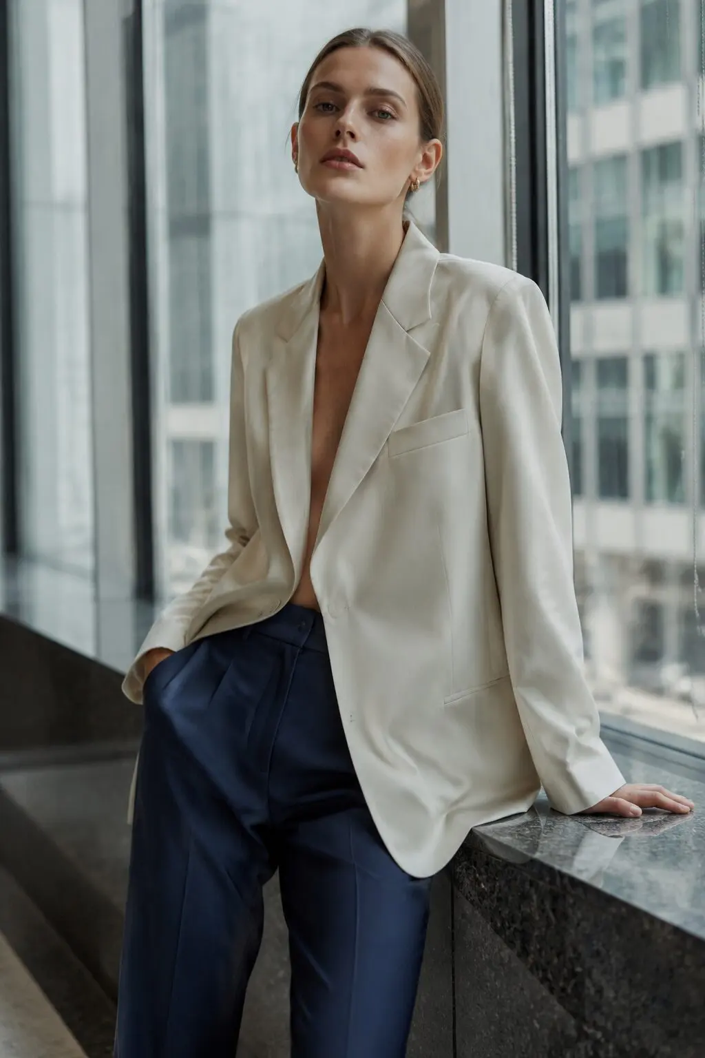 navy cigarette pants and oversized cream blazer outfit for a client meeting