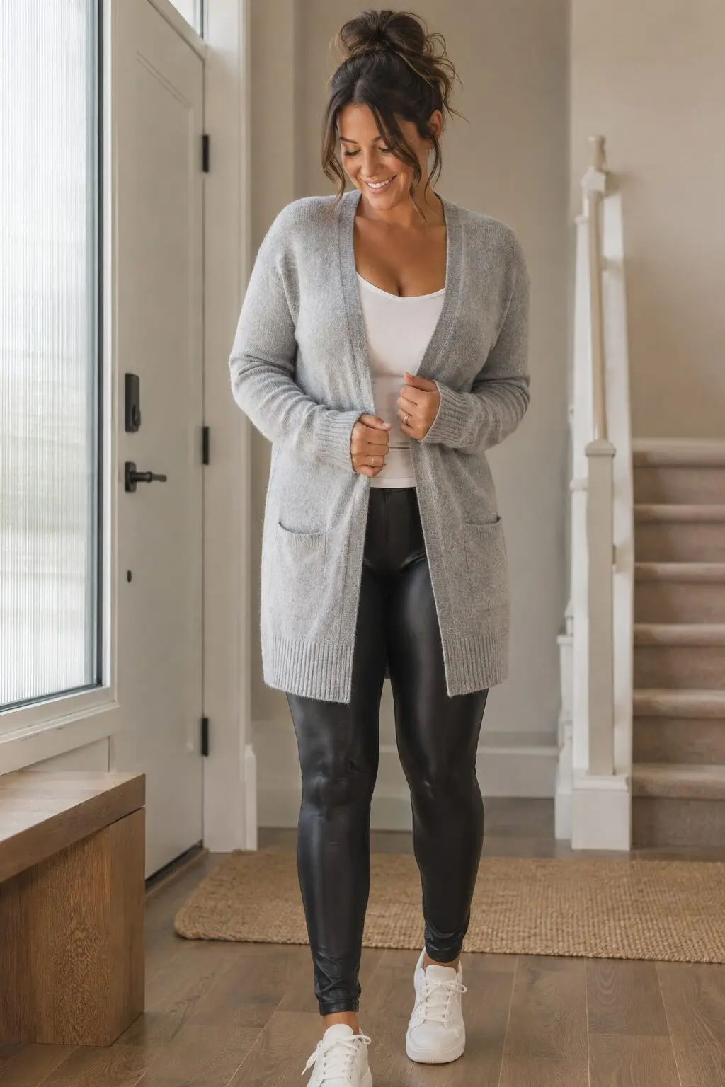 how to style a cardigan with leggings: heather grey longline cardigan over black faux-leather leggings, casual outfit