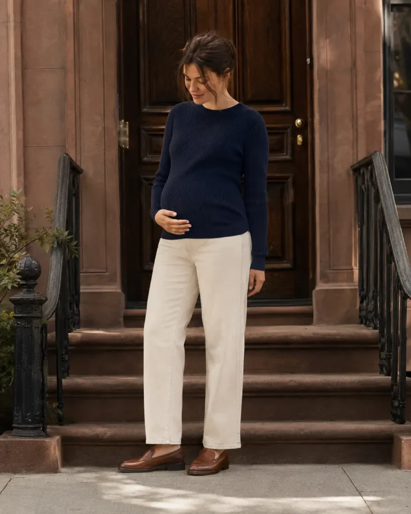 11. Navy knit, ecru jeans and brown loafers.