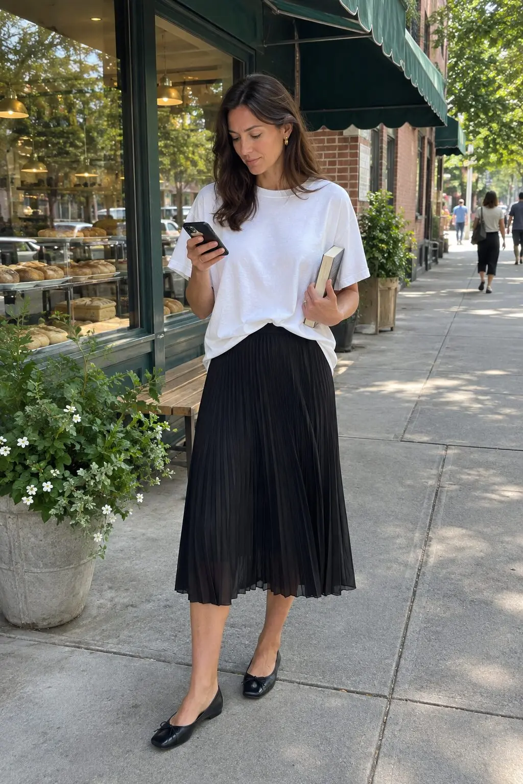 how to style a midi skirt with a white tee: black pleated chiffon midi skirt, oversized white cotton tee and black leather ballet flats