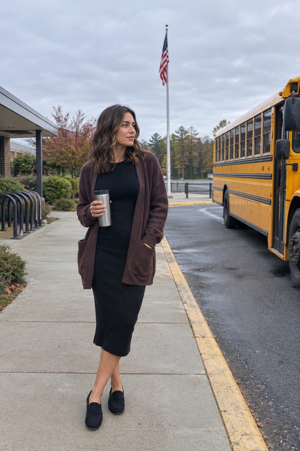 chic halloween teacher outfit: black ribbed knit midi dress with a plum-brown cardigan and black loafers