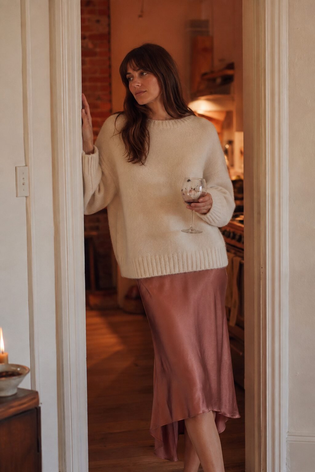 cream knit sweater over a dusty rose silk slip dress, an affordable halloween party guest outfit that looks expensive