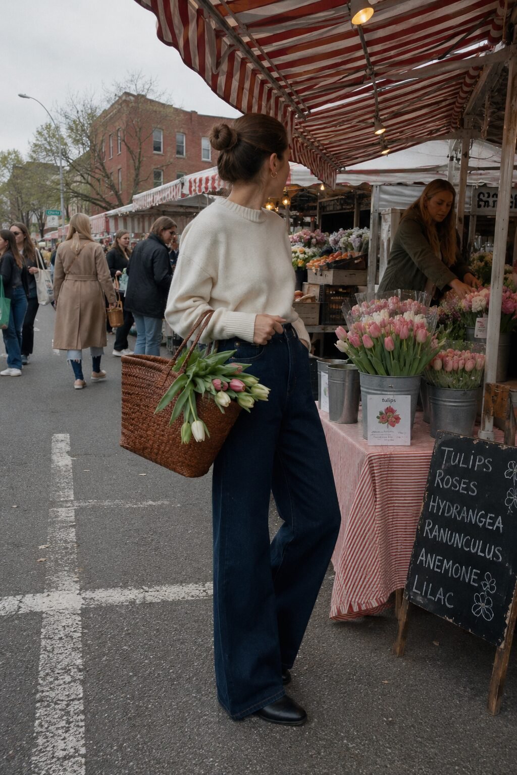 capsule wardrobe essentials: ivory cashmere crewneck tucked into dark wide-leg denim for weekend errands