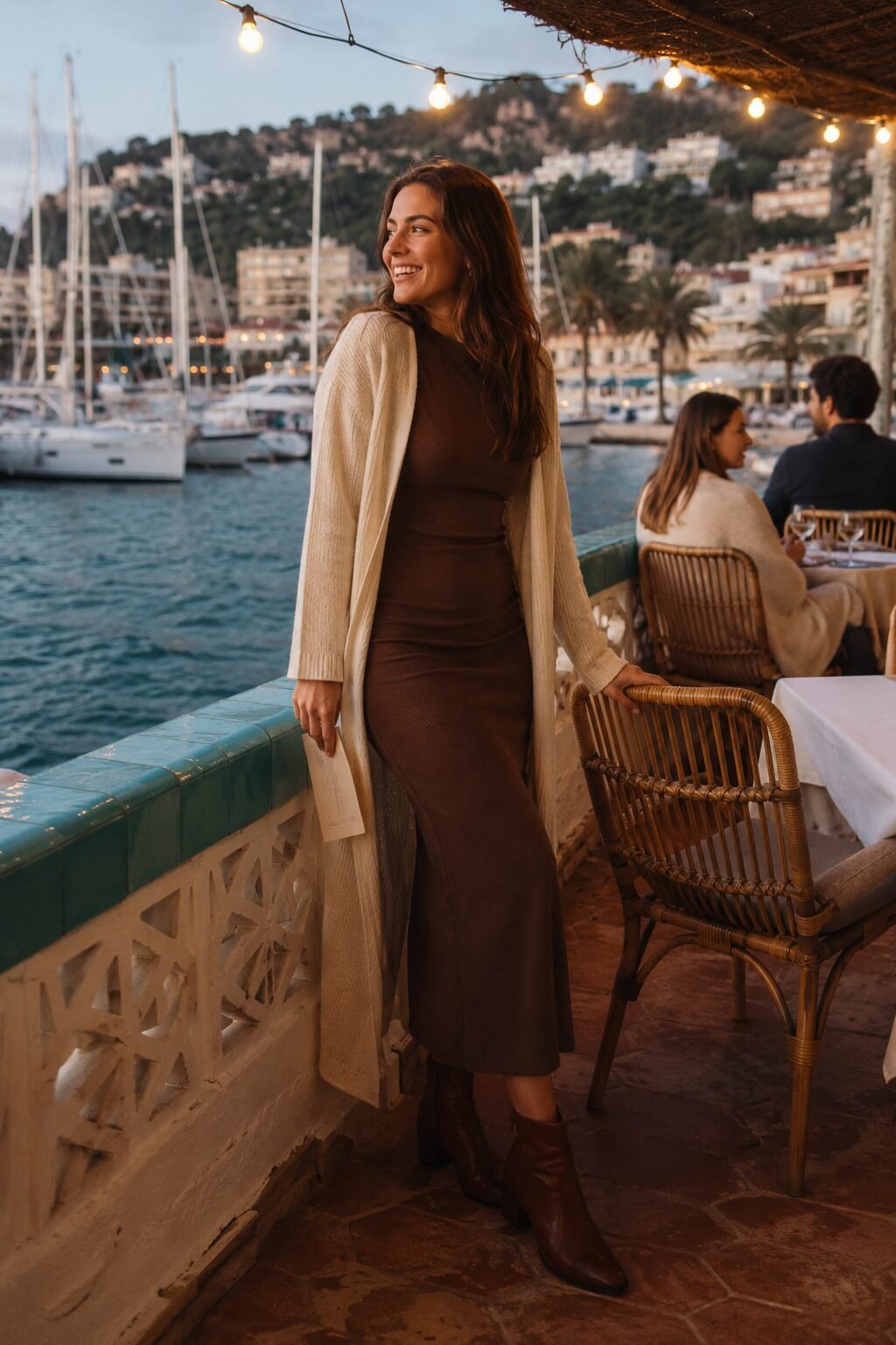 how to style a cardigan with a midi dress: cream open cardigan over a chocolate brown midi dress for dinner