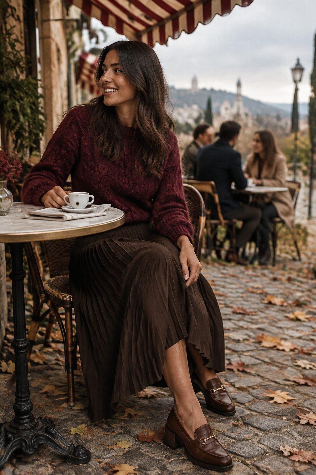 italian style fall outfit: burgundy cable-knit sweater with a pleated chocolate skirt and brown loafers
