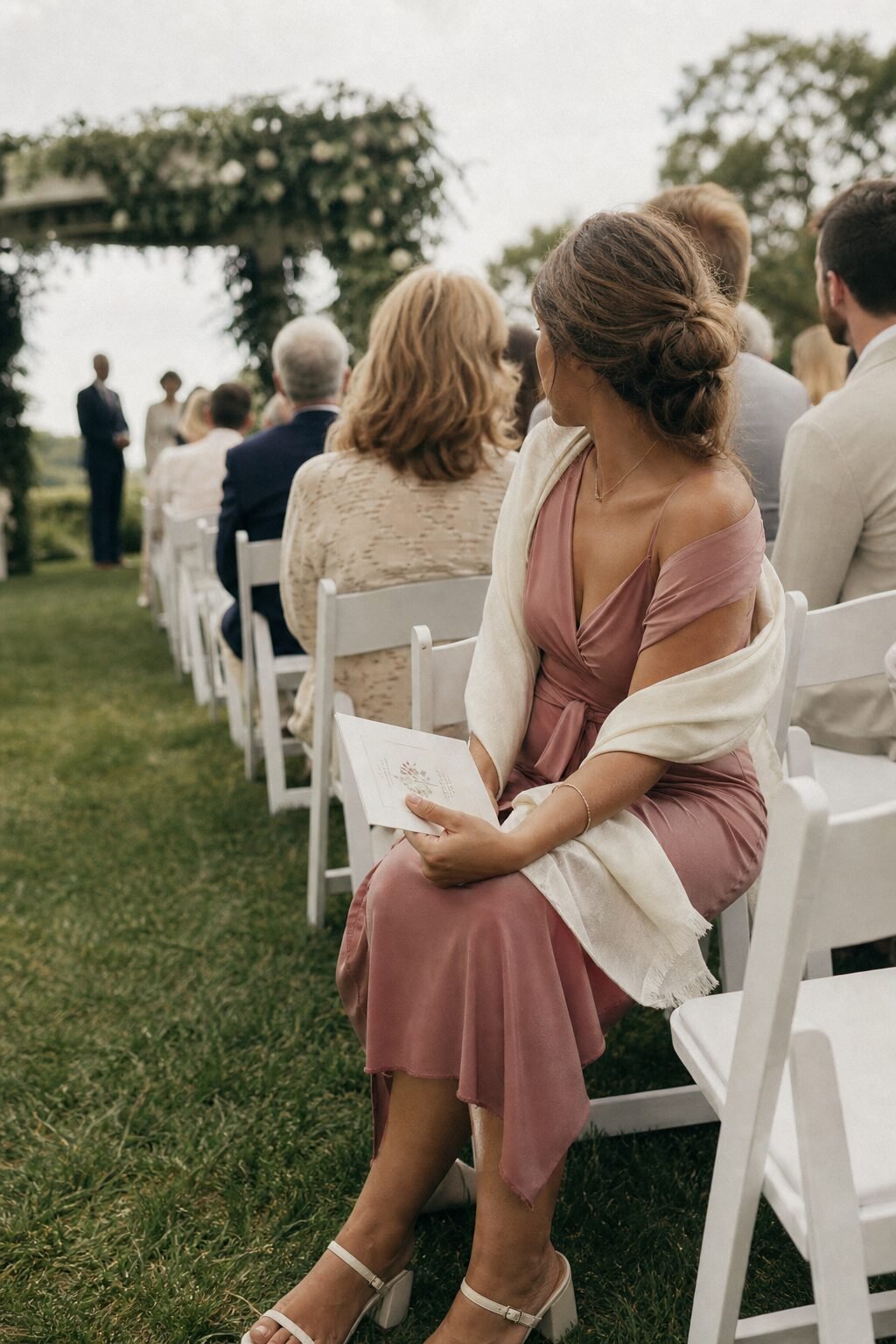 how to style a wrap dress with a statement shawl: dusty rose wrap dress and ivory shawl for an outdoor garden ceremony