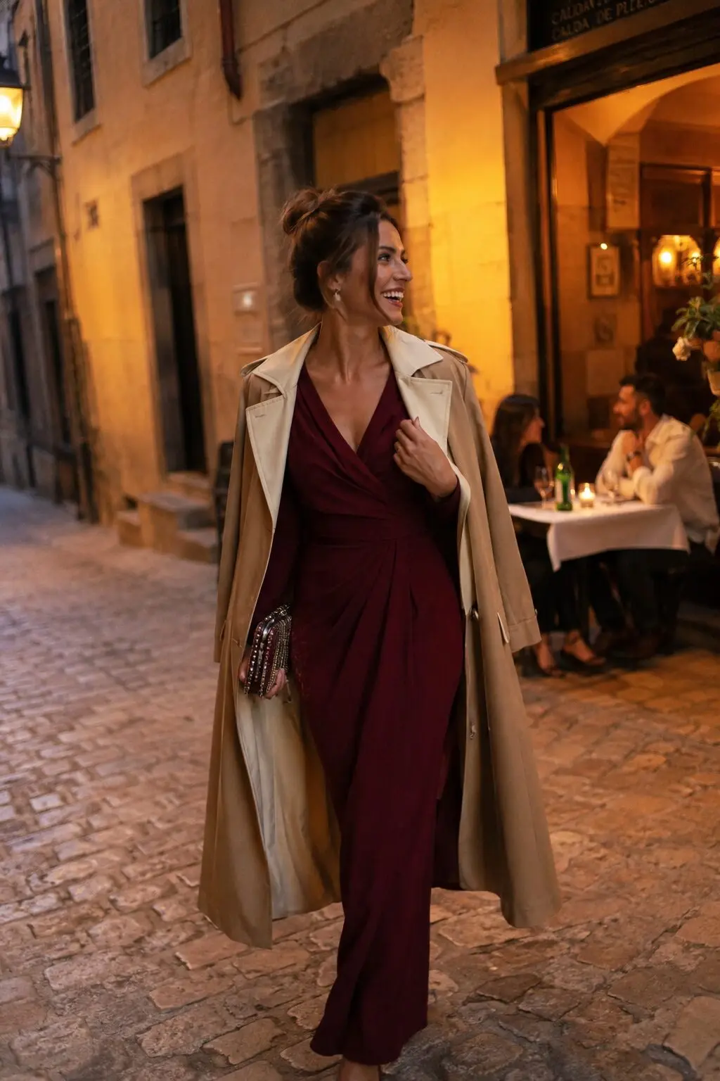 burgundy wrap dress styled with an open camel trench, elevated fall dinner outfit