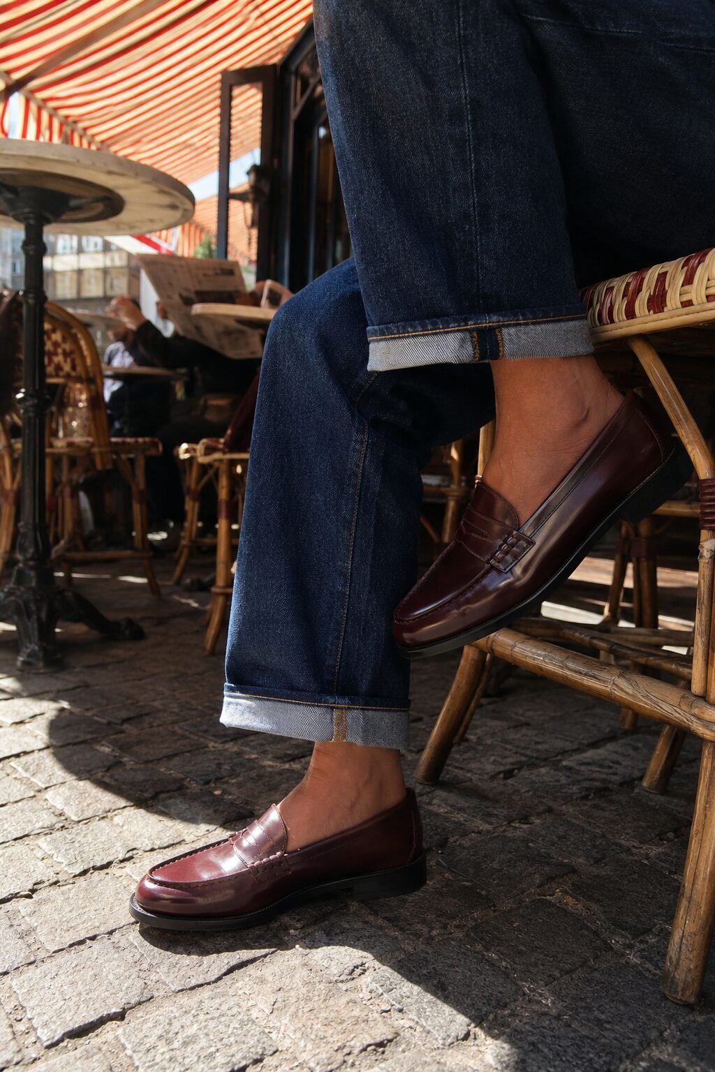 timeless style vs trendy fashion: wide-leg indigo jeans, ivory ribbed turtleneck, and burgundy leather loafers