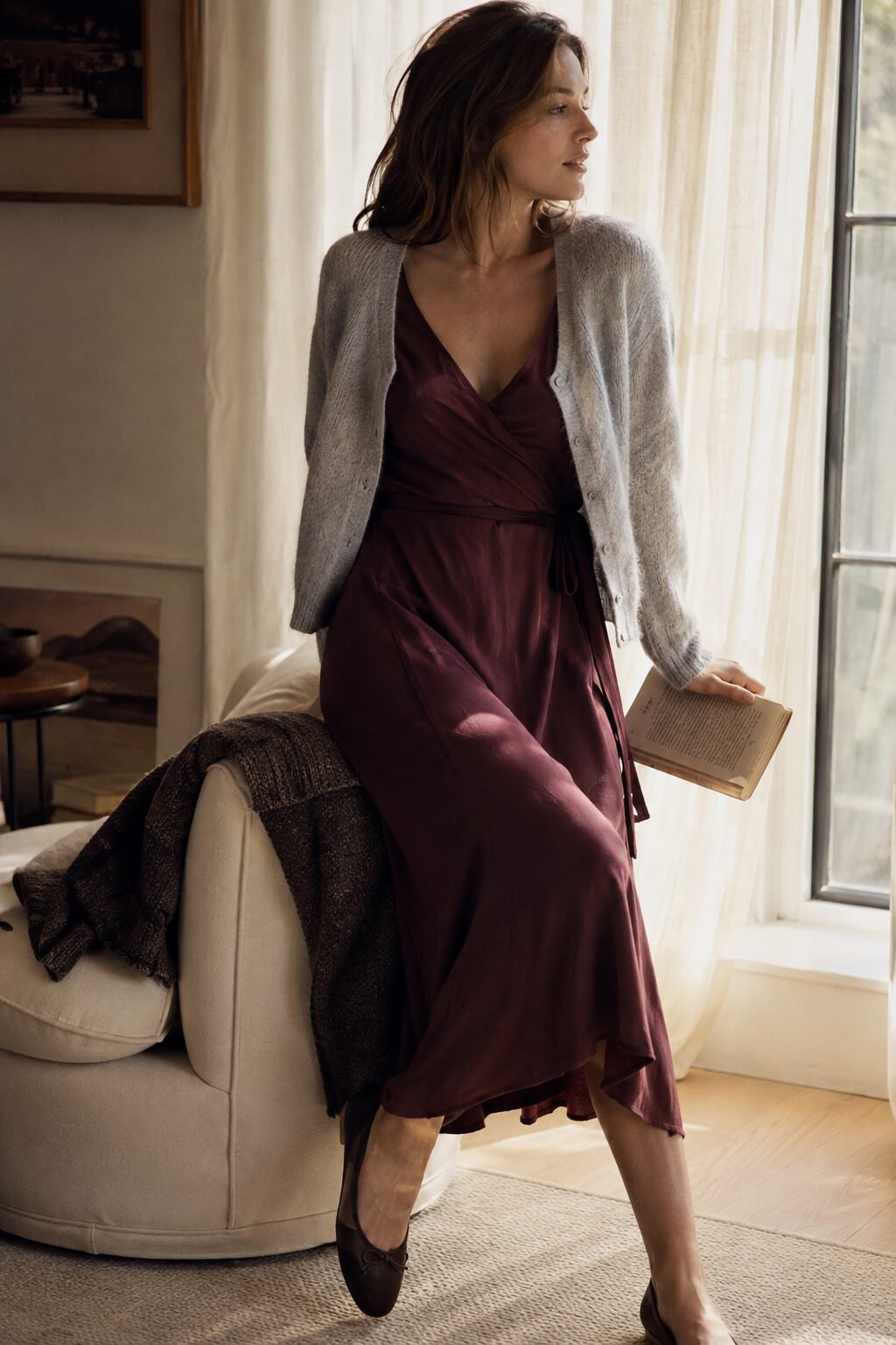comfortable elegant work from home outfit: wine tencel jersey wrap dress with heather grey alpaca cardigan draped over shoulders