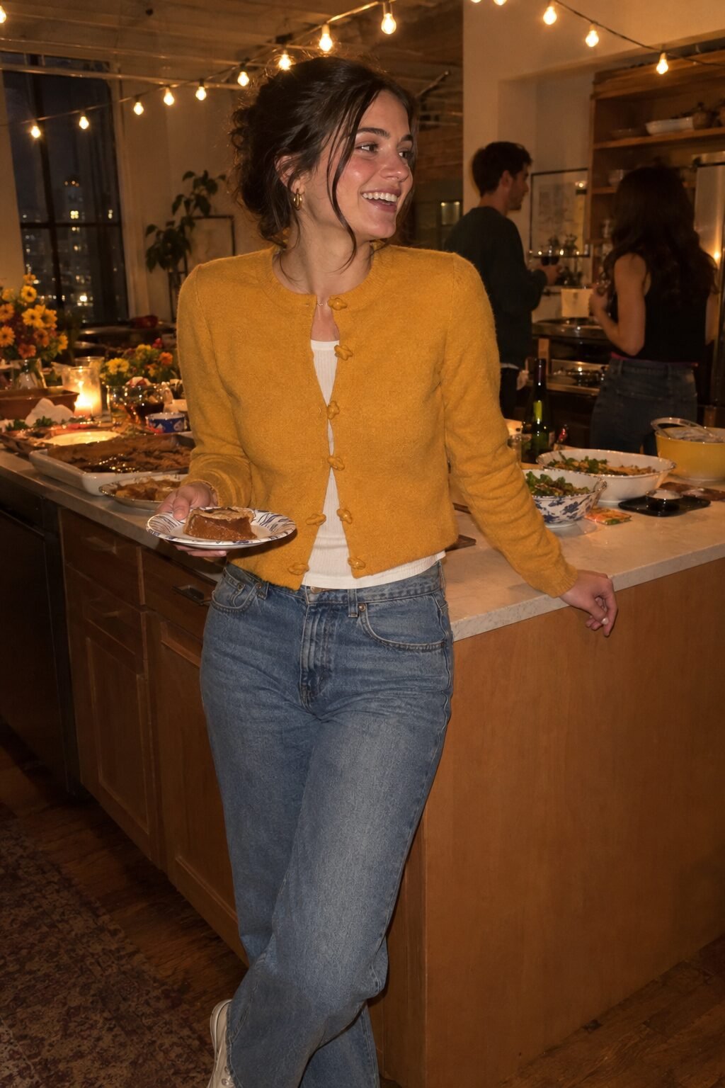 cute thanksgiving outfit for friendsgiving: mustard cashmere cardigan and high-rise straight leg jeans