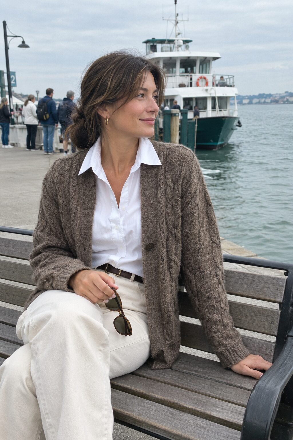old money outfit: white cotton poplin shirt under an oversized heather brown cable knit cardigan