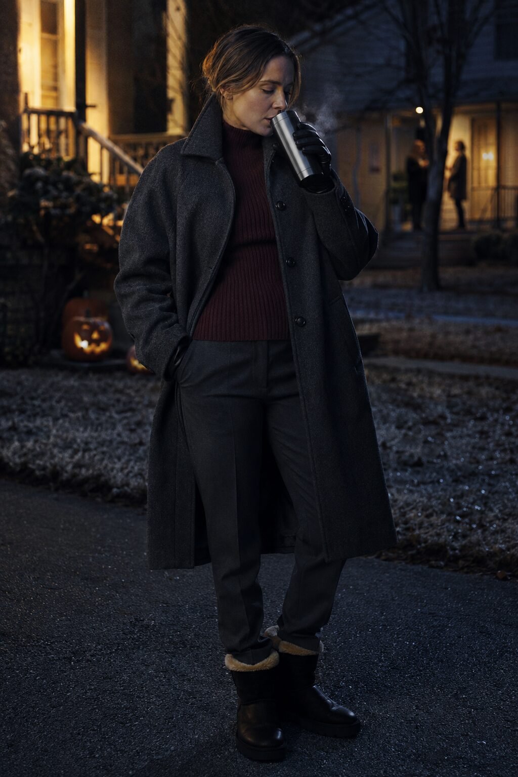 charcoal grey oversized wool coat over a burgundy ribbed sweater and slim trouser, warm halloween outfit for moms trick-or-treating in cold weather