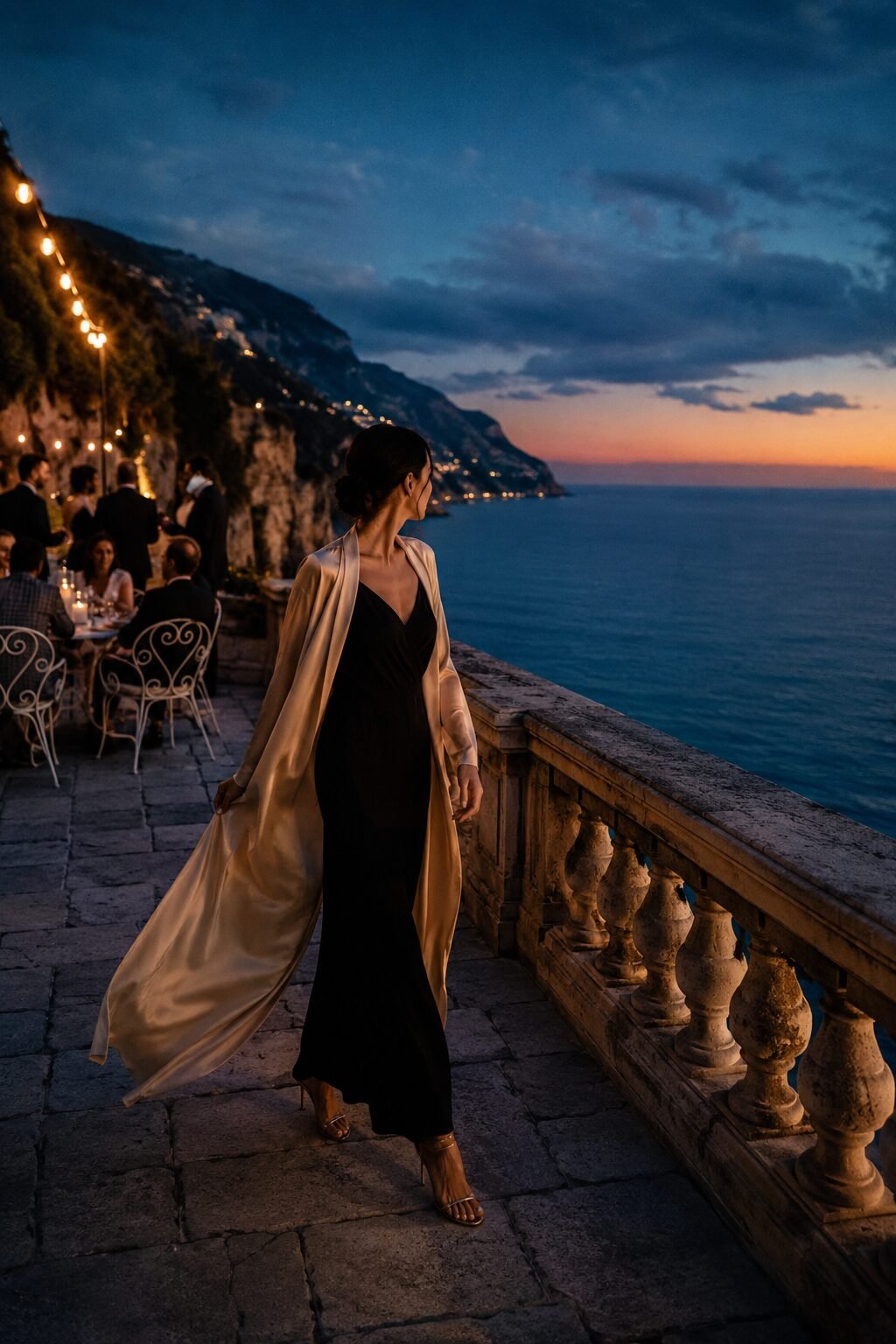 how to style a wrap dress with a silk duster coat: black wrap dress and champagne duster for a formal evening wedding