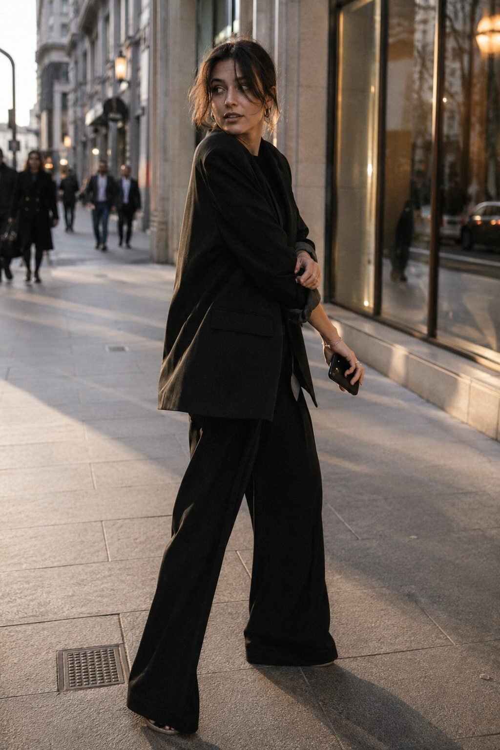 affordable elegant all black halloween outfit: oversized blazer over wide-leg trousers
