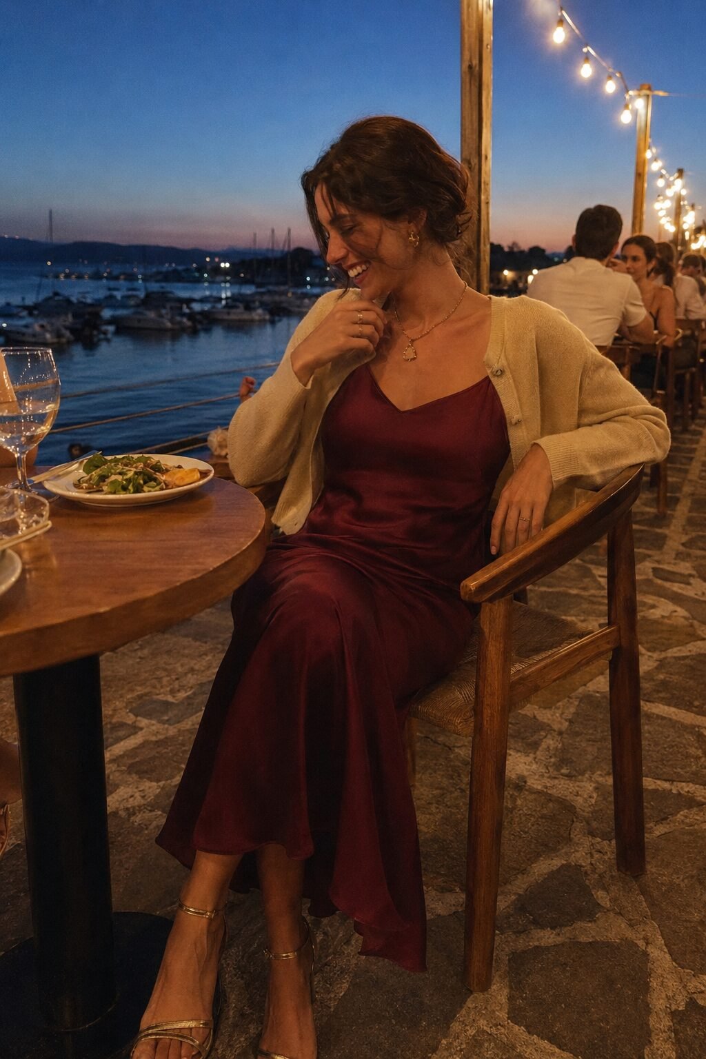 timeless style vs trendy fashion: burgundy silk slip dress, oatmeal cashmere cardigan, and gold strappy heels