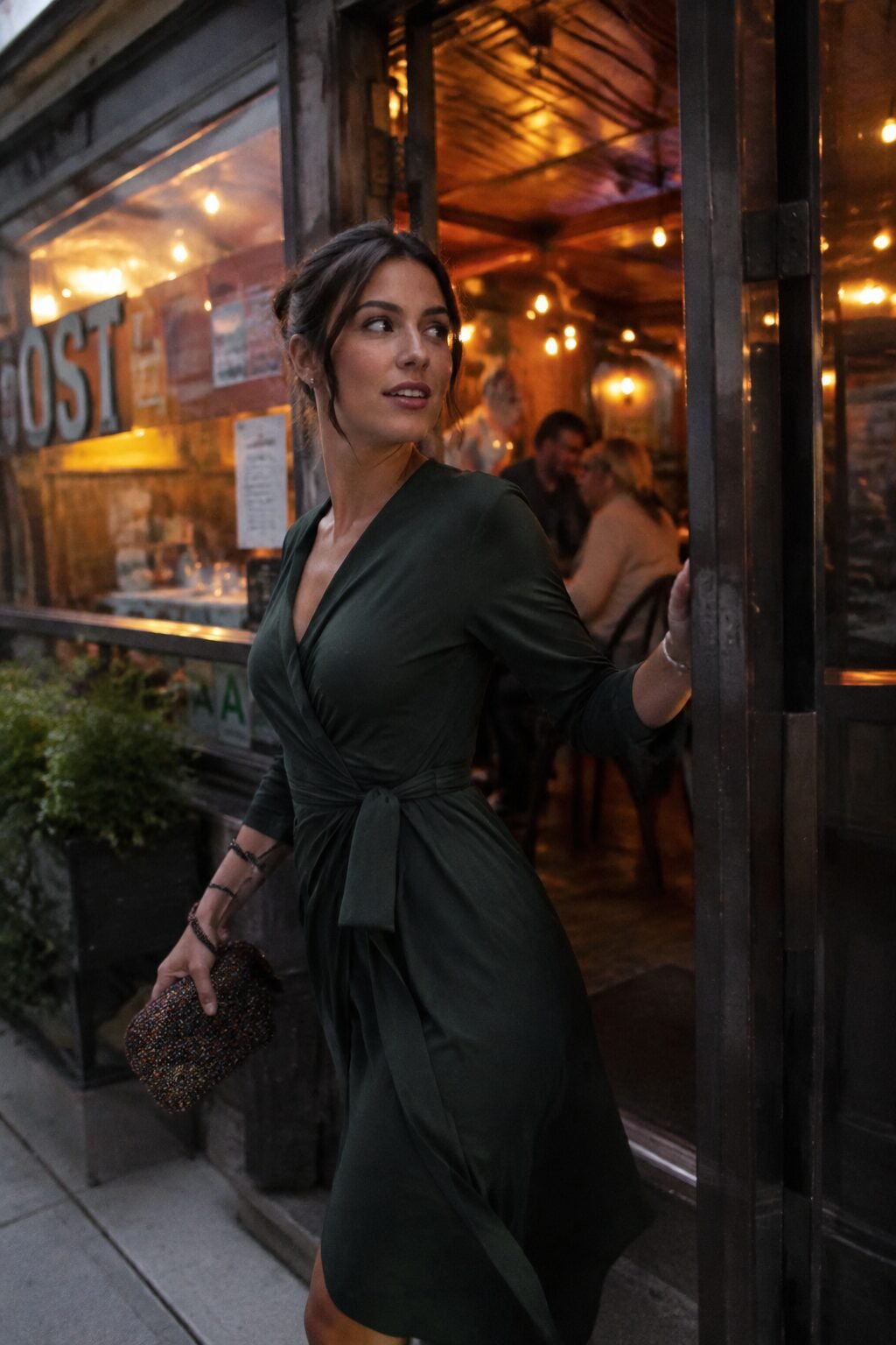 no-effort elegant outfit: deep forest green self-tie jersey wrap dress for a quick dinner out