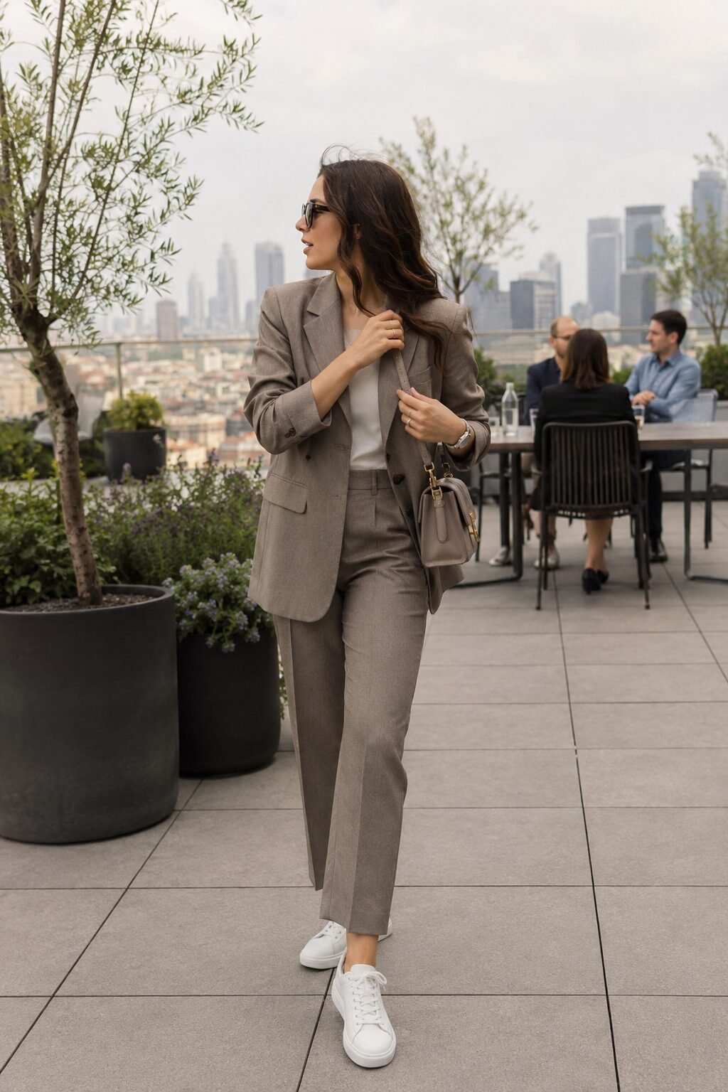 elegant white sneaker outfit with a tonal taupe blazer and trouser set