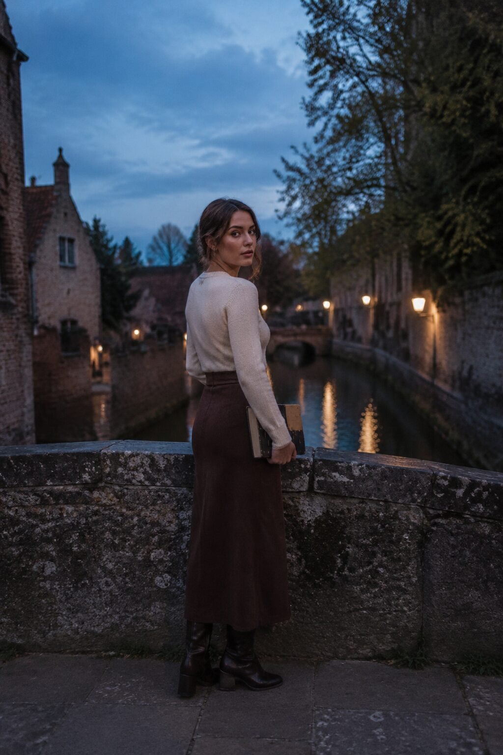 chocolate brown midi skirt and cream sweater weekend away outfit for a cool evening