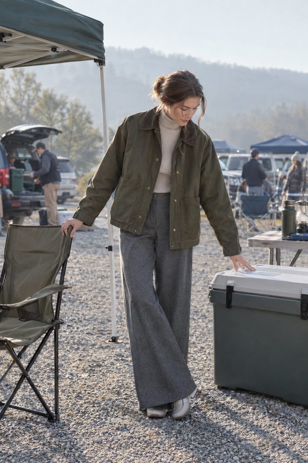elegant fall tailgate outfit: olive twill barn jacket, ribbed turtleneck, and grey wide-leg wool trousers