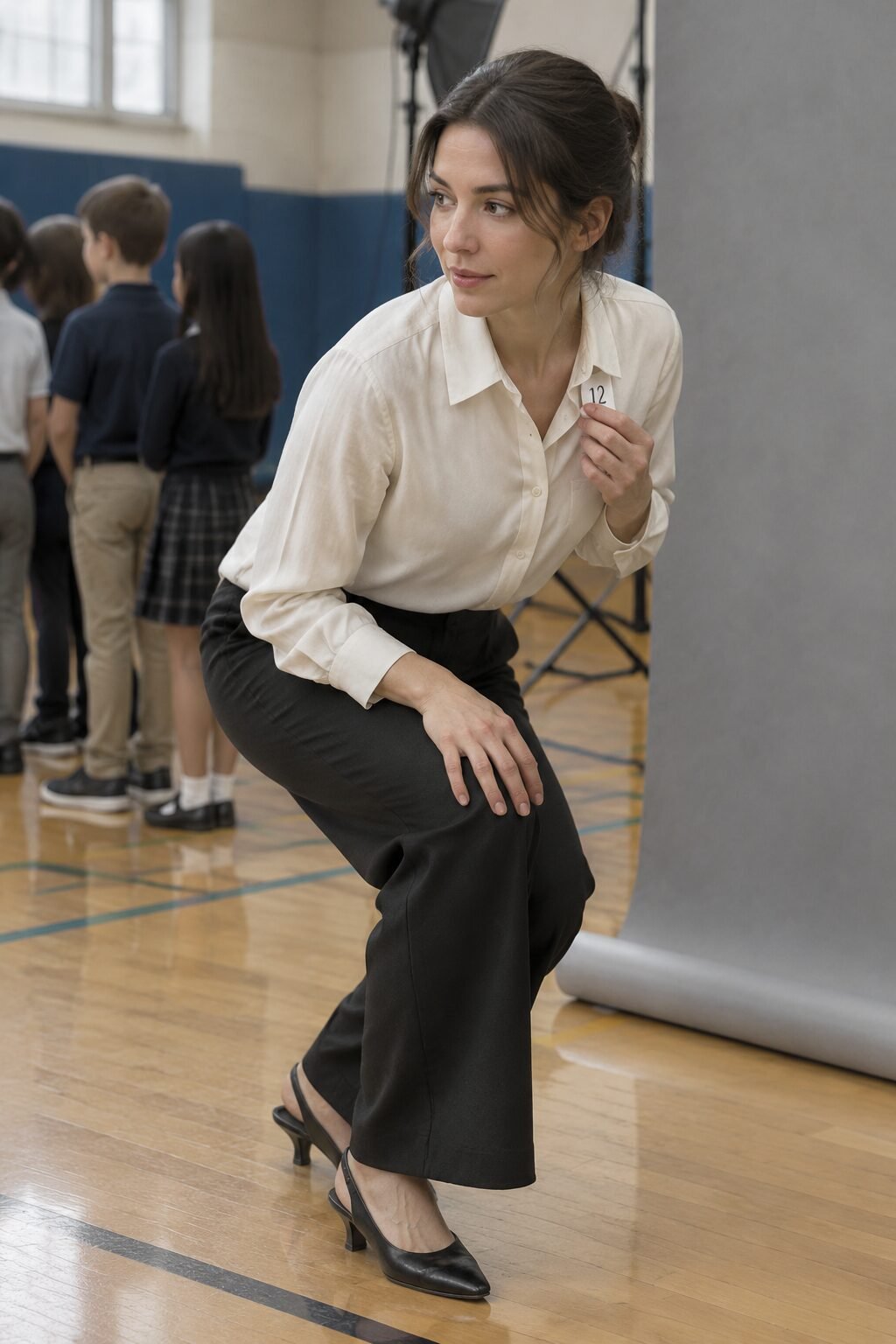 picture day teacher outfit: off-white silk blouse, black wide-leg trousers, and black slingback heels