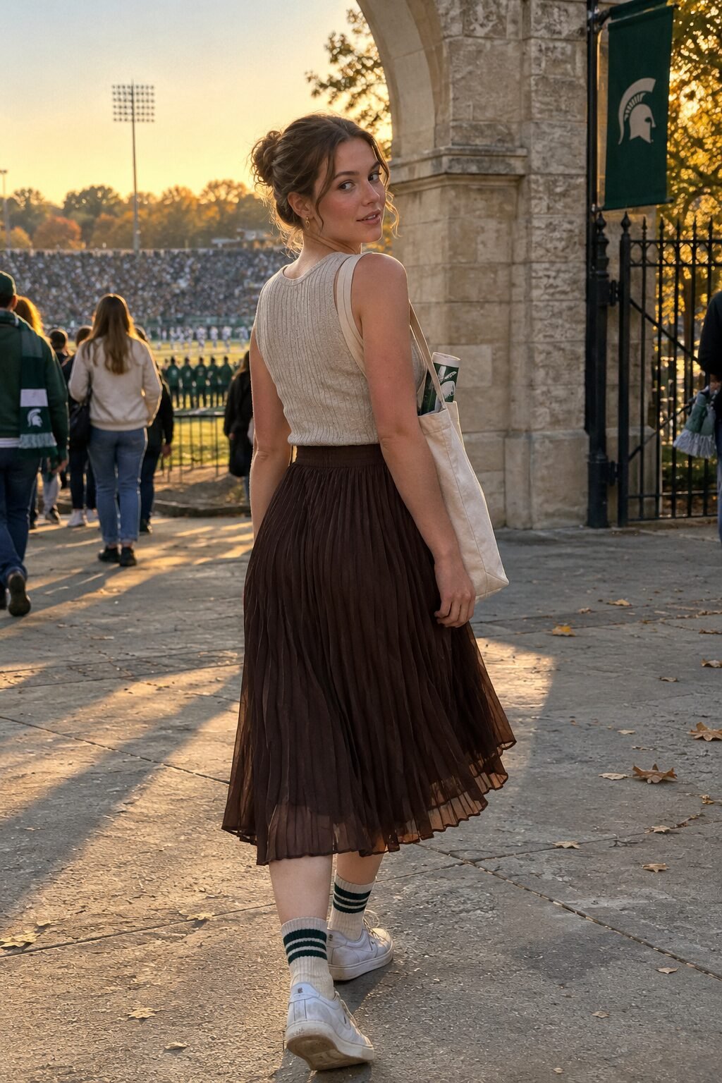preppy spirit week outfit: brown pleated skirt and ribbed cashmere tank for sports jersey day