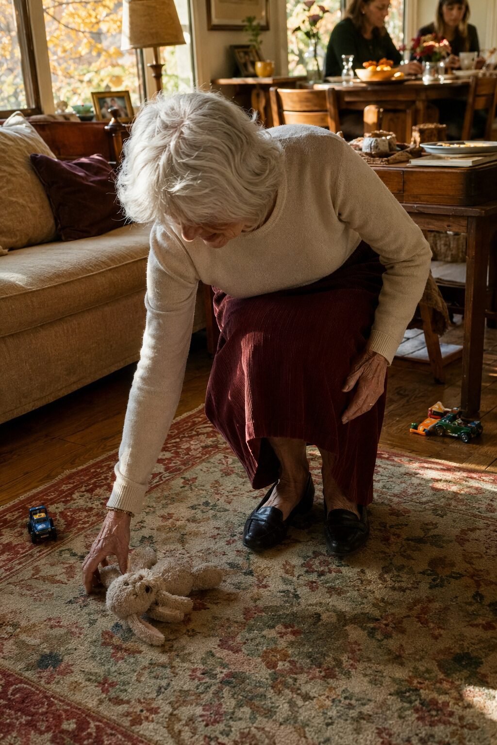 thanksgiving outfit for women in their 70s: burgundy corduroy A-line skirt and cream sweater for a casual family Thanksgiving with grandkids