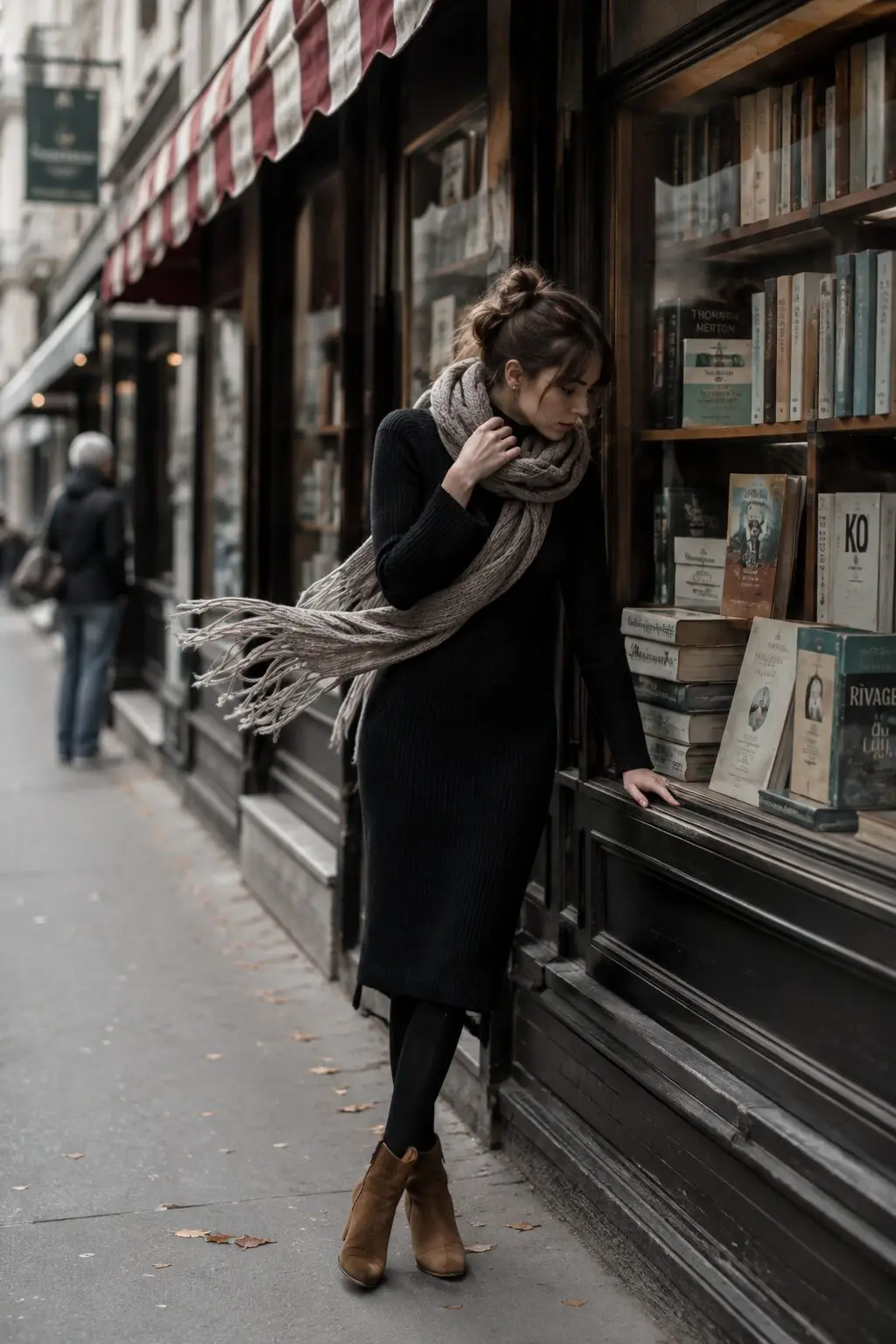 black midi dress with opaque black tights and cropped ankle boots