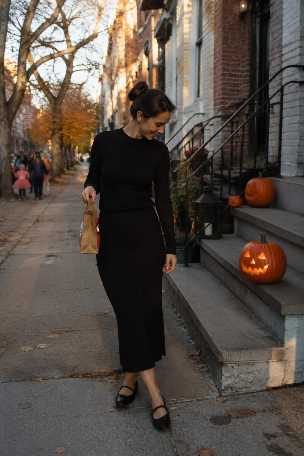 cozy all black halloween outfit: matching knit top and midi skirt set