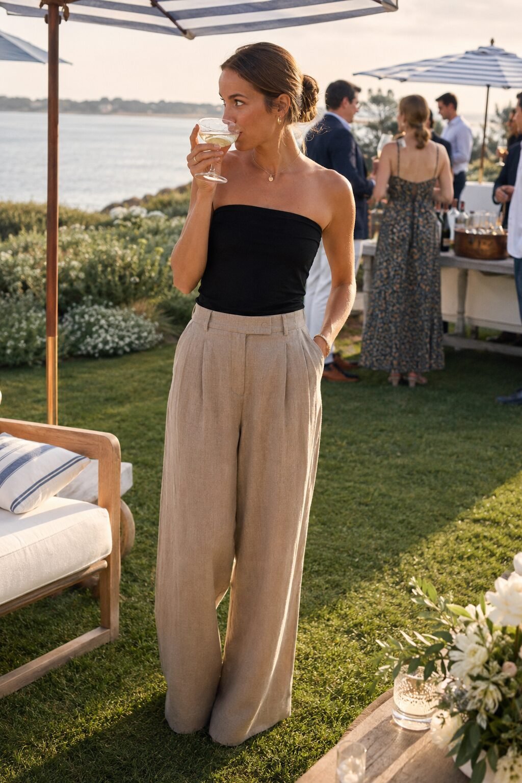 outdoor summer party linen pants outfit: driftwood wide-leg linen pants and black tube top