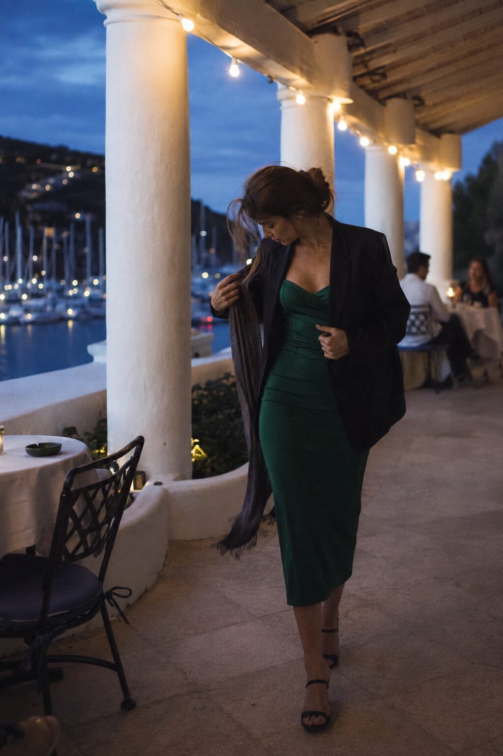 how to style a black blazer with a cocktail dress for a Halloween-season evening event