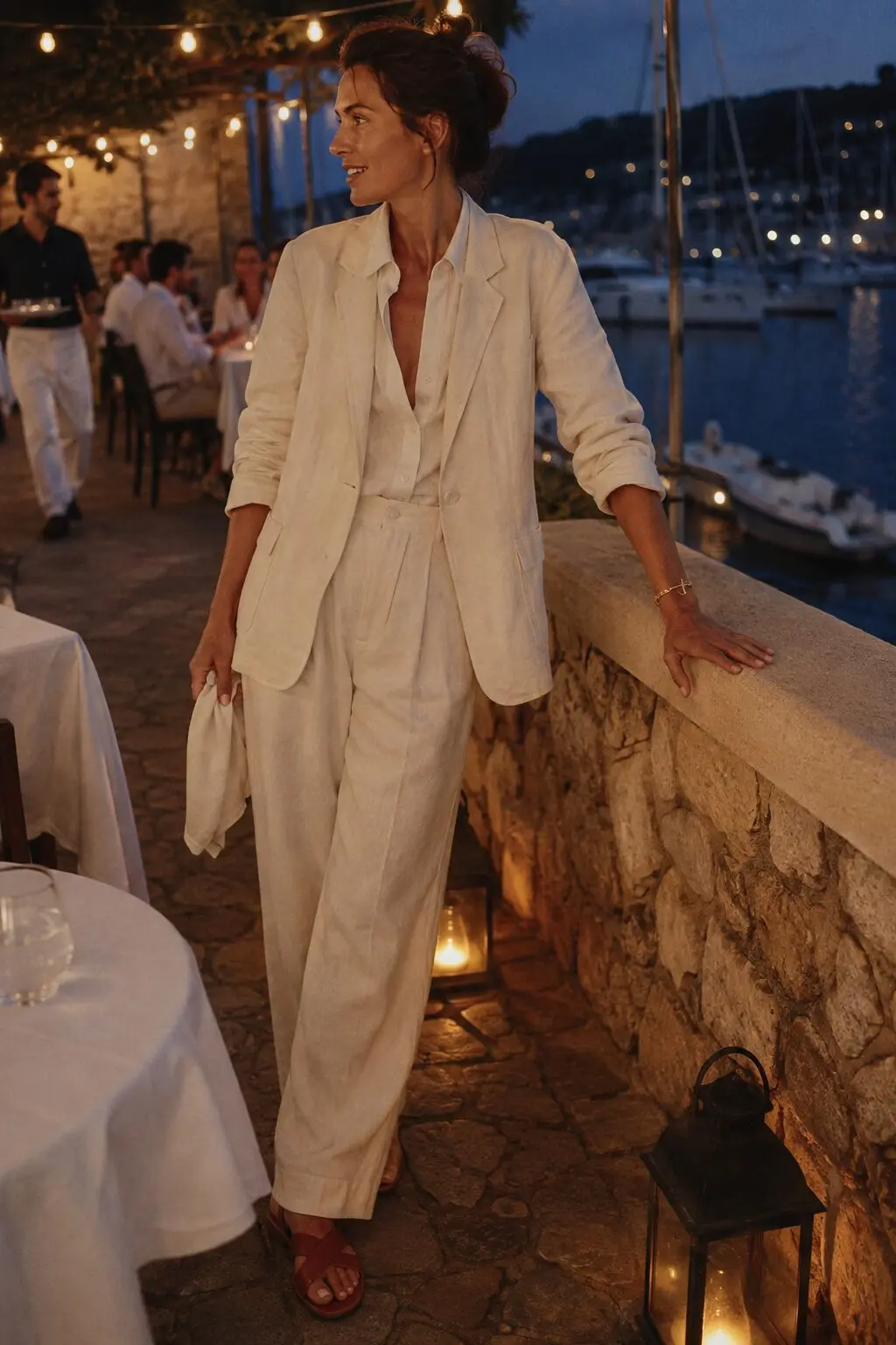 old money boat outfit with cream linen matching suit and sienna brown leather crossover sandals for a yacht club dinner