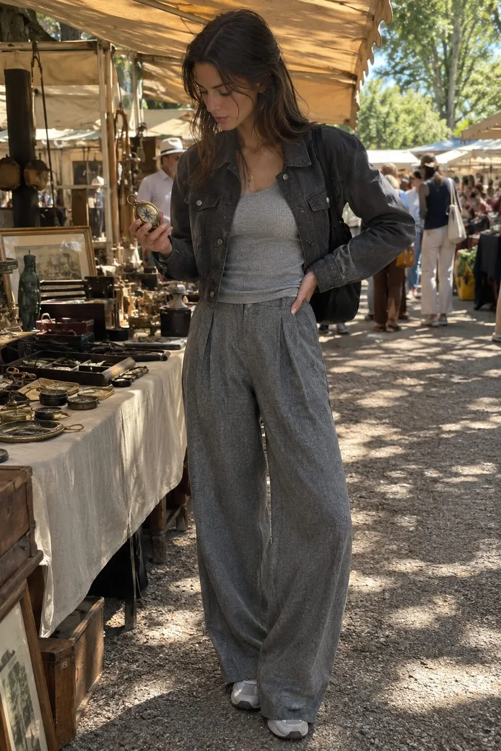 charcoal and grey fall outfit: heather grey knit tank tucked into a wide-leg grey trouser