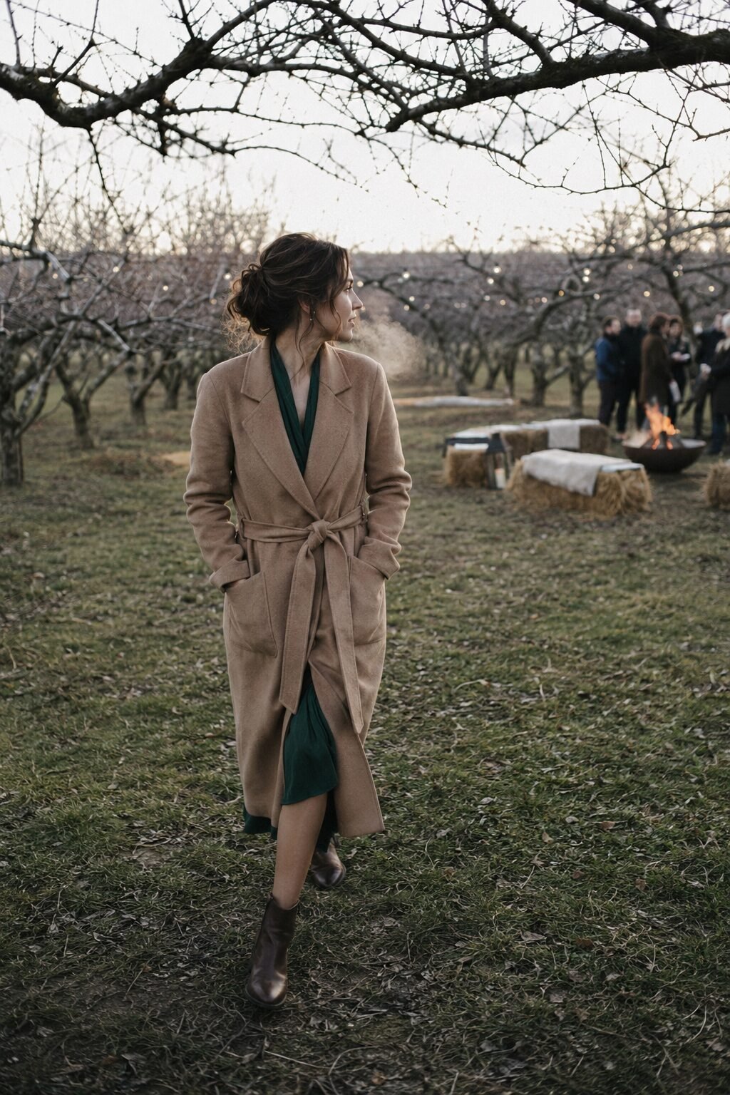 how to style a wrap dress with a wrap coat: forest green wrap dress and camel wrap coat for a late-fall outdoor wedding