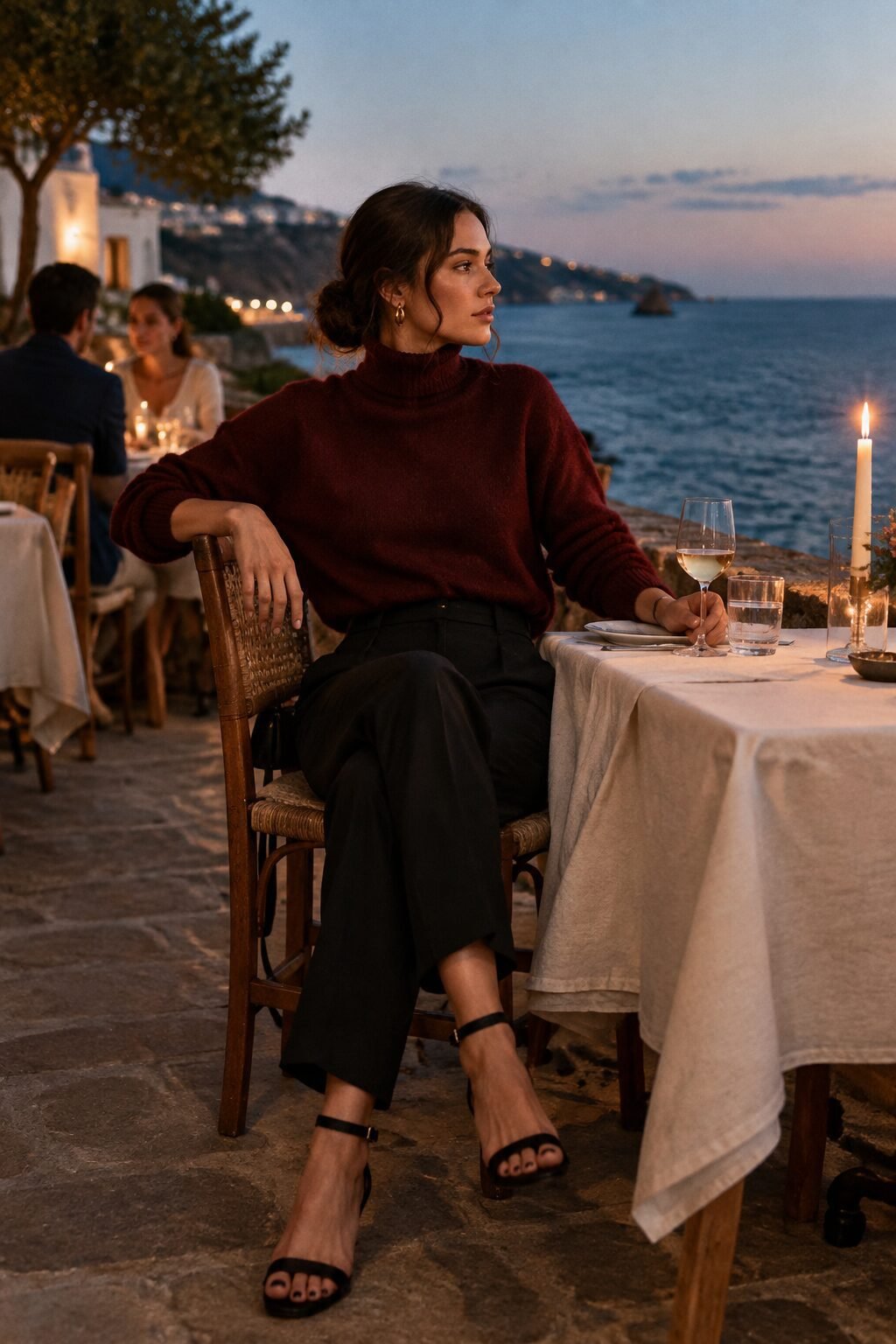 carolyn bessette style dinner outfit: deep burgundy cashmere turtleneck with black leather ankle-strap sandals