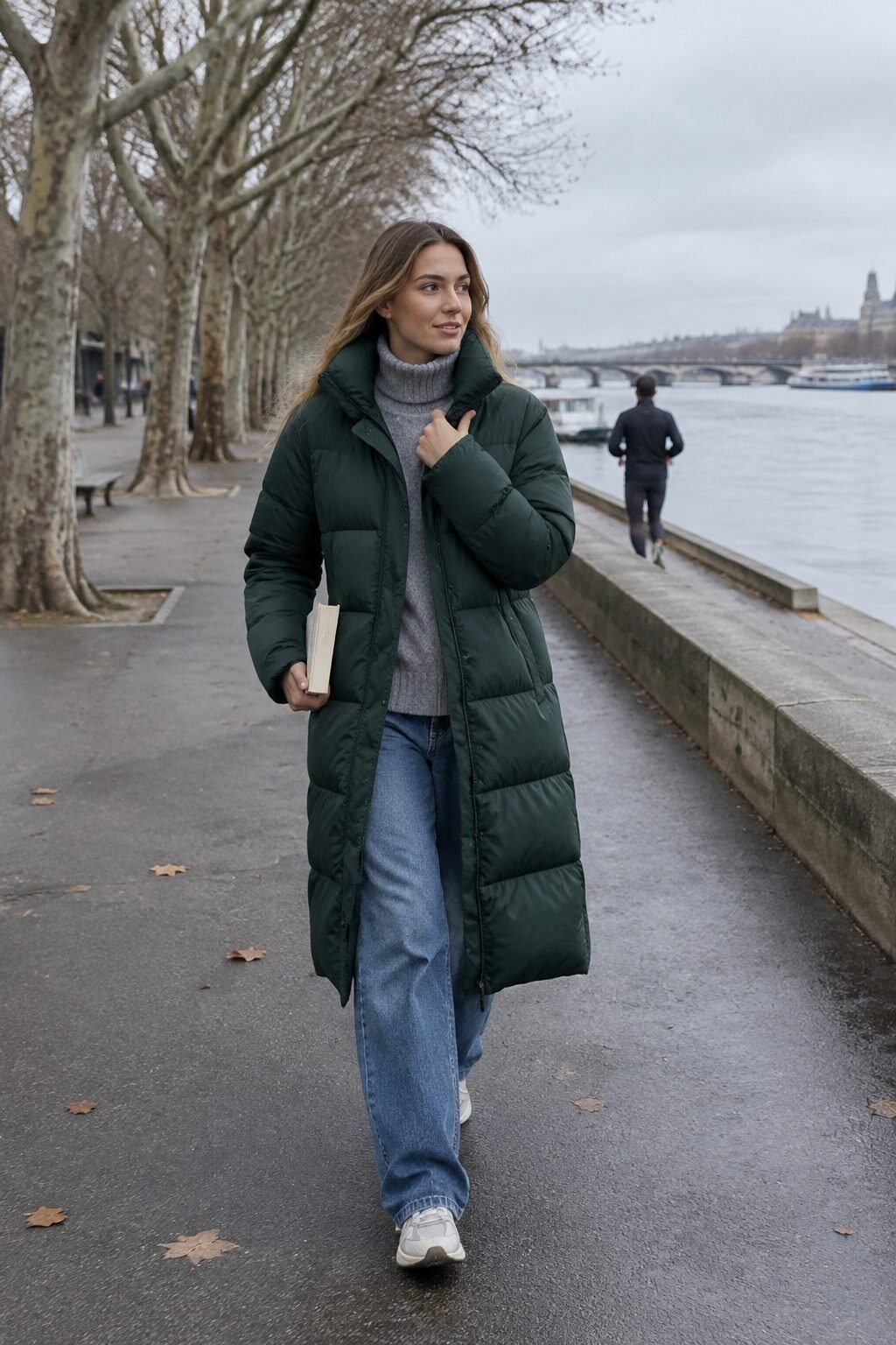 european winter outfit: forest green long puffer coat over oversized turtleneck with baggy straight jeans